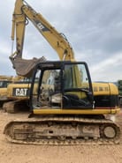 2014 Caterpillar 312C crawler excavator side view 2014 Caterpillar 312C crawler excavator side view