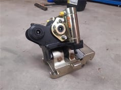 Tiltman Mini Excavator tiltrotator attachment, close-up view Tiltman Mini Excavator tiltrotator attachment, close-up view