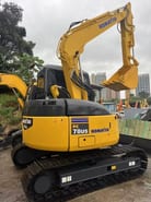 2022 Komatsu PC78US crawler excavator, rear three-quarter view 2022 Komatsu PC78US crawler excavator, rear three-quarter view