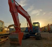 Hitachi ZX210 crawler excavator, front three-quarter view Hitachi ZX210 crawler excavator, front three-quarter view