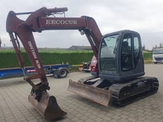 2005 New Holland E70 mini excavator, side view 2005 New Holland E70 mini excavator, side view