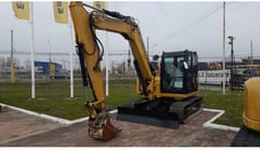 2019 Caterpillar 308E2CR crawler excavator, front three-quarter view 2019 Caterpillar 308E2CR crawler excavator, front three-quarter view