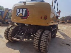 2023 Caterpillar M315GC wheel excavator rear view