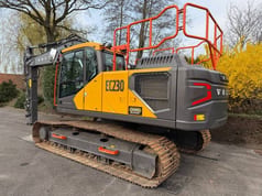 2025 Volvo EC230 crawler excavator, rear three-quarter view