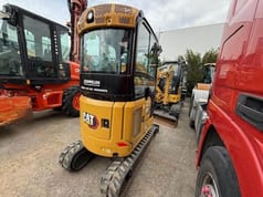 2022 Caterpillar 302-05 mini excavator, front view