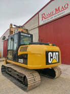 2010 Caterpillar 312D crawler excavator, rear three-quarter view