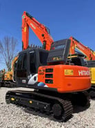 2024 Hitachi Zaxis 120 crawler excavator, rear three-quarter view