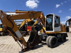 1999 Liebherr A316 wheel excavator, front three-quarter view 1999 Liebherr A316 wheel excavator, front three-quarter view