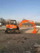 2023 Doosan DH55 mini excavator, side profile view