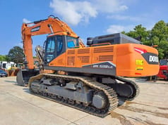 2023 Doosan DX530LC-7M crawler excavator, rear three-quarter view