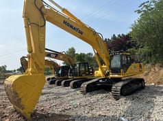 Komatsu PC450 crawler excavator, front three-quarter view