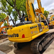 2024 Komatsu PC200 crawler excavator, rear three-quarter view