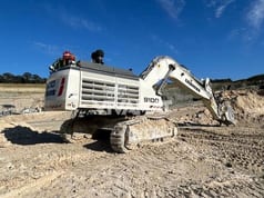 2019 Liebherr R9100 crawler excavator, rear three-quarter view