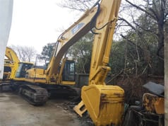 2023 Caterpillar 330BL crawler excavator, front three-quarter view