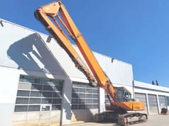 2012 Doosan DX420LC demolition excavator, side view with high-reach boom