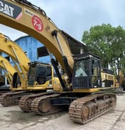 2010 Caterpillar 349D crawler excavator, side view