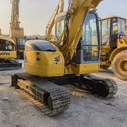 2023 Komatsu PC78US excavator, rear three-quarter view 2023 Komatsu PC78US excavator, rear three-quarter view