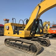 2023 Caterpillar 323GC crawler excavator, side view