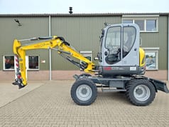 2015 Wacker Neuson 6503-2 wheel excavator, side profile view 2015 Wacker Neuson 6503-2 wheel excavator, side profile view