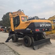 2024 Hyundai R210W-9T wheel excavator, rear three-quarter view 2024 Hyundai R210W-9T wheel excavator, rear three-quarter view