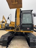 2022 Caterpillar 312D mini excavator, front view