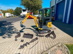 Kubota BK1250KSR mini excavator with accessory package, side view