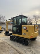 2023 Caterpillar 305.5GC crawler excavator, rear three-quarter view