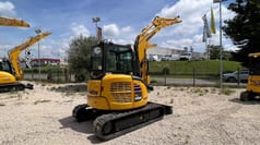 2023 Komatsu PC45 MR-5 mini excavator, rear three-quarter view 2023 Komatsu PC45 MR-5 mini excavator, rear three-quarter view