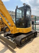 2022 Komatsu PC55 mini excavator, front three-quarter view