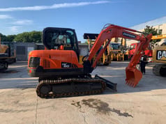 2021 Doosan DX60 mini excavator side view 2021 Doosan DX60 mini excavator side view