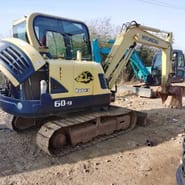 2023 Hyundai R60-9 mini excavator, rear three-quarter view