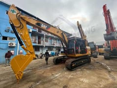 Гусеничный экскаватор 2022 Caterpillar 320DL, вид сбоку