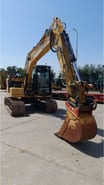 2021 Caterpillar 313-07GC crawler excavator, front three-quarter view