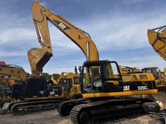 2021 Caterpillar 325CL crawler excavator, side profile view