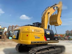 2019 Caterpillar 320D2 crawler excavator, rear three-quarter view