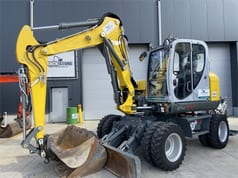 2022 Wacker Neuson EW100 wheel excavator, side profile view 2022 Wacker Neuson EW100 wheel excavator, side profile view