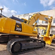 2024 Komatsu PC300 crawler excavator, rear three-quarter view
