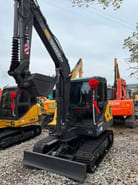 2024 Volvo EC60D mini excavator, front three-quarter view