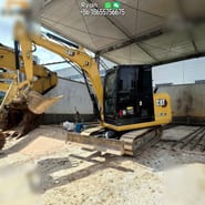 2022 Caterpillar 305.5E2 mini excavator, side view 2022 Caterpillar 305.5E2 mini excavator, side view