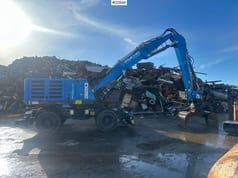 2025 Fuchs MHL320 SS wheel excavator, side profile view