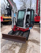 2017 Takeuchi TB240 mini excavator front three-quarter view 2017 Takeuchi TB240 mini excavator front three-quarter view