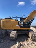 2014 Caterpillar 336E LN crawler excavator, side profile view