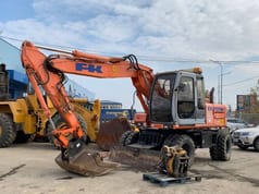 2003 Fiat-Kobelco EX135W wheel excavator, side view 2003 Fiat-Kobelco EX135W wheel excavator, side view