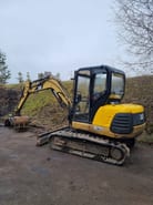 2001 Caterpillar 304.5 mini excavator, rear three-quarter view 2001 Caterpillar 304.5 mini excavator, rear three-quarter view
