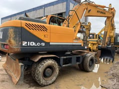 2019 Hyundai 210LC-9 wheel excavator, rear three-quarter view 2019 Hyundai 210LC-9 wheel excavator, rear three-quarter view