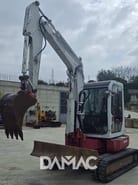 2007 Takeuchi TB153 mini excavator, front three-quarter view 2007 Takeuchi TB153 mini excavator, front three-quarter view