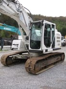 2014 Caterpillar 320EL crawler excavator, side view