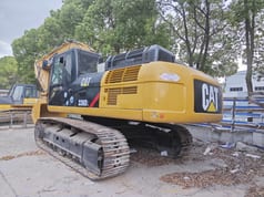 Caterpillar 336DL crawler excavator rear three-quarter view