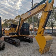 Caterpillar 312D2GC crawler excavator, side view Caterpillar 312D2GC crawler excavator, side view