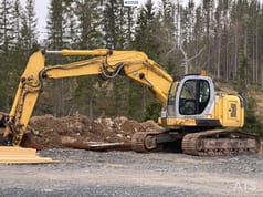 2006 New Holland E235SR crawler excavator side view 2006 New Holland E235SR crawler excavator side view